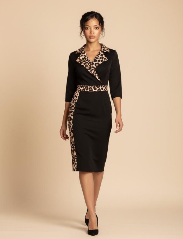 Robe noire courte élégante à manches longues, col blazer et coupe près…